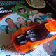 Illustration for article titled Just some bored dude taking pics of crappy diecasts at a boring yard sale...